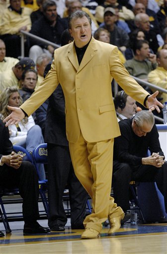  coach Huggins got a new gold suit.